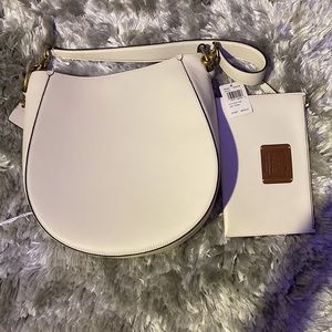 Coach bag with matching wallet . Never used with tags.